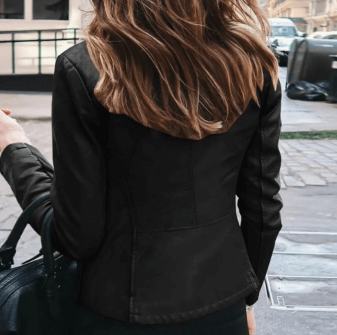 Classic black jacket displayed against a neutral background, showcasing its sleek design and versatile style for any wardrobe.