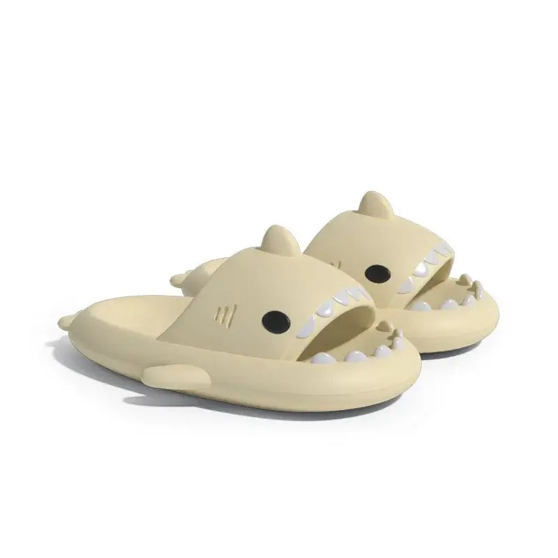 Beige shark design slippers, ideal for summer wear with a lightweight feel.
