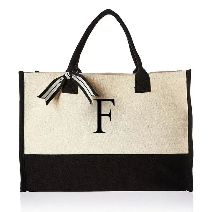 Contemporary bag with letter F detailing, designed for versatility and style. Perfect for casual outings or as a chic accessory for various occasions.