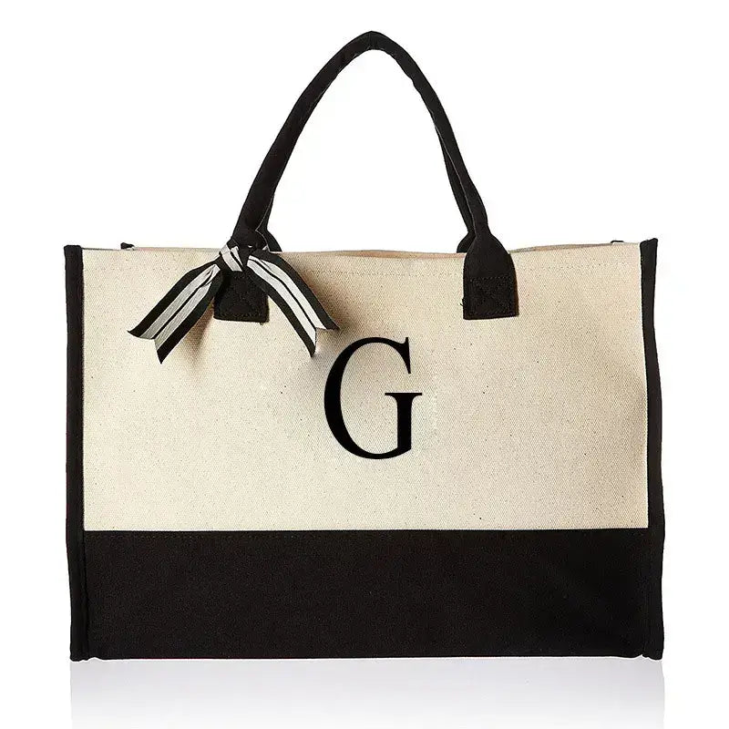 Stylish bag featuring letter G, ideal for making a fashion statement. Perfect for everyday use, providing functionality and a trendy design for all.