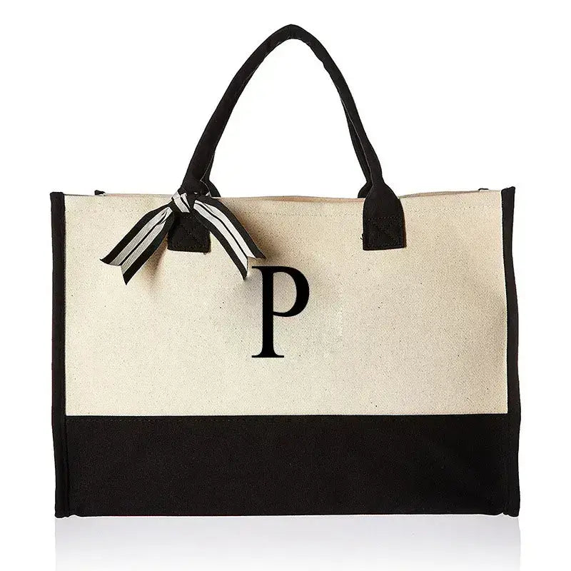 Stylish bag featuring letter P detailing, combining practicality with fashion. Ideal for everyday use, offering ample space and a trendy design for all.