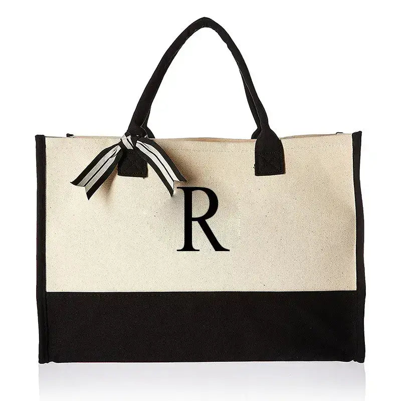 Elegant bag featuring letter R, designed for those who appreciate unique accessories. Perfect for casual outings and everyday use, stylish and functional.