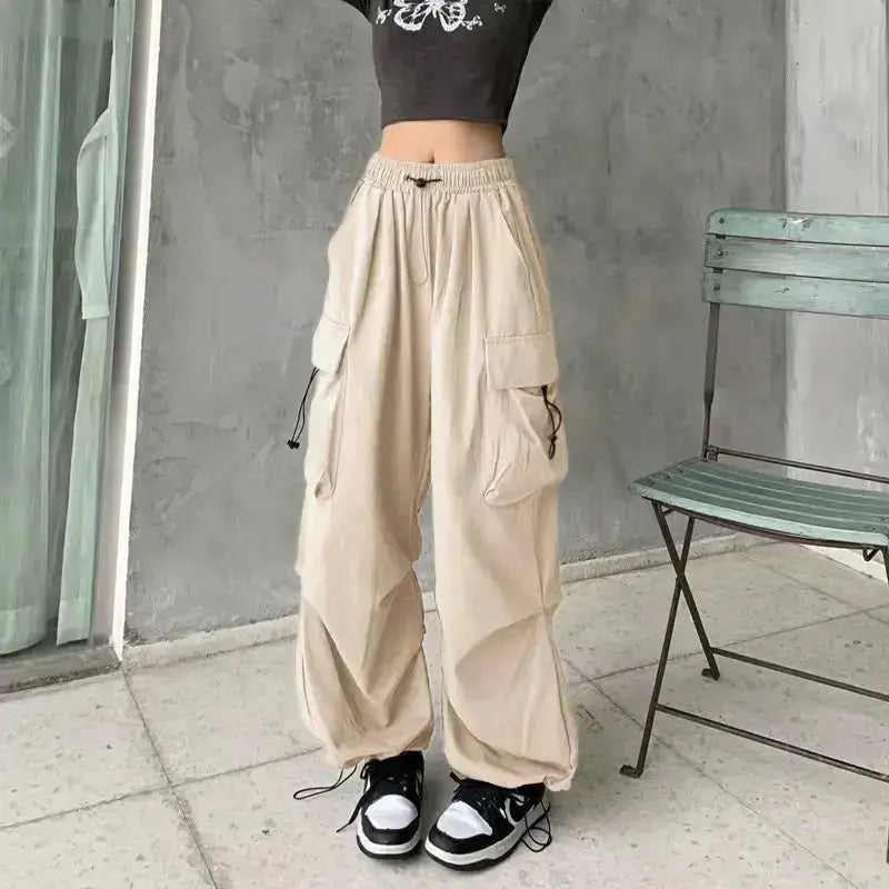 Chic beige Baggy Y2K women's trousers featuring a relaxed fit, perfect for casual outings or stylish streetwear. Made from soft fabric for all-day comfort.