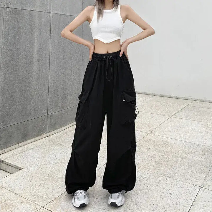 Stylish black Baggy Y2K women's trousers with a relaxed fit, ideal for casual outings or streetwear looks. Crafted from soft fabric for ultimate comfort.