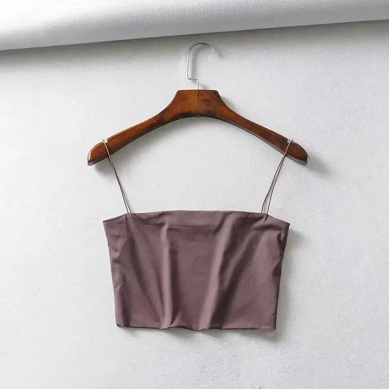 Trendy brown elastic women's crop top, made from breathable knitted fabric, ideal for layering or wearing alone for a relaxed vibe.