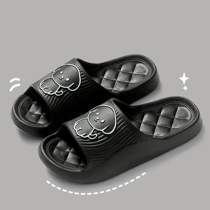 Unisex couple pillow slippers in black. Experience warmth and style with these cozy slippers, designed for couples.
