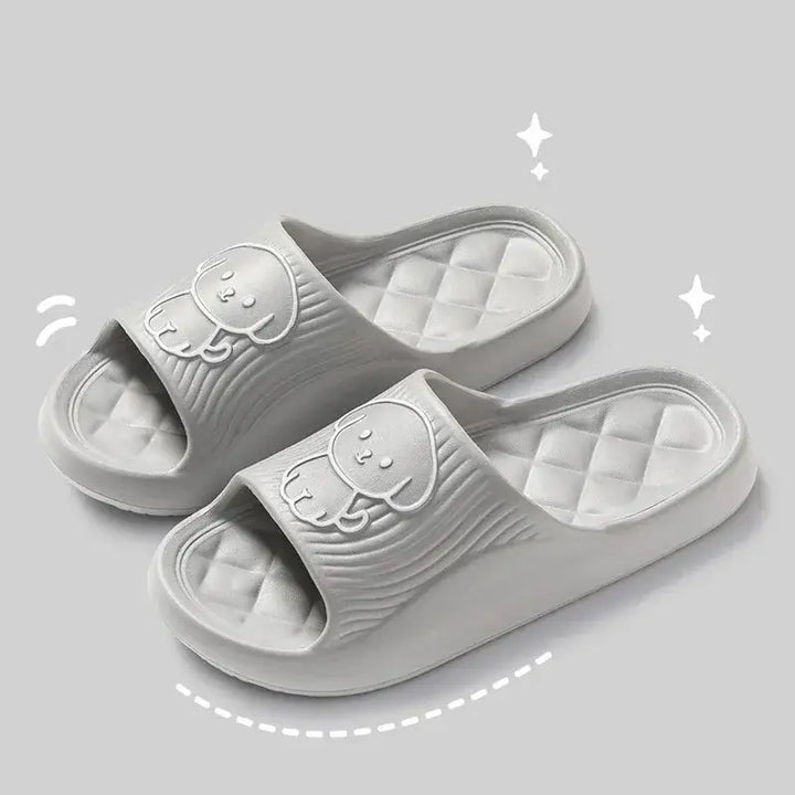 Unisex couple pillow slippers in gray. Perfect for lounging, these cozy slippers provide ultimate comfort for couples.
