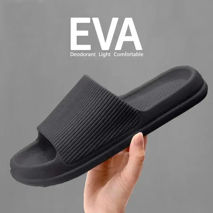 Stylish black couple slippers designed for ultimate comfort. These non-slip indoor slippers are perfect for casual outings and cozy moments together.
