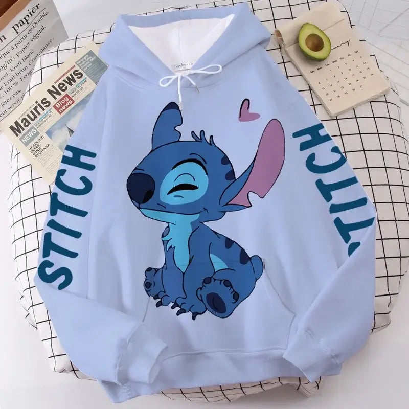 Trendy blue Disney-themed sweatshirt featuring a unique patchwork design. Combines comfort and style, perfect for any winter activity or relaxation.