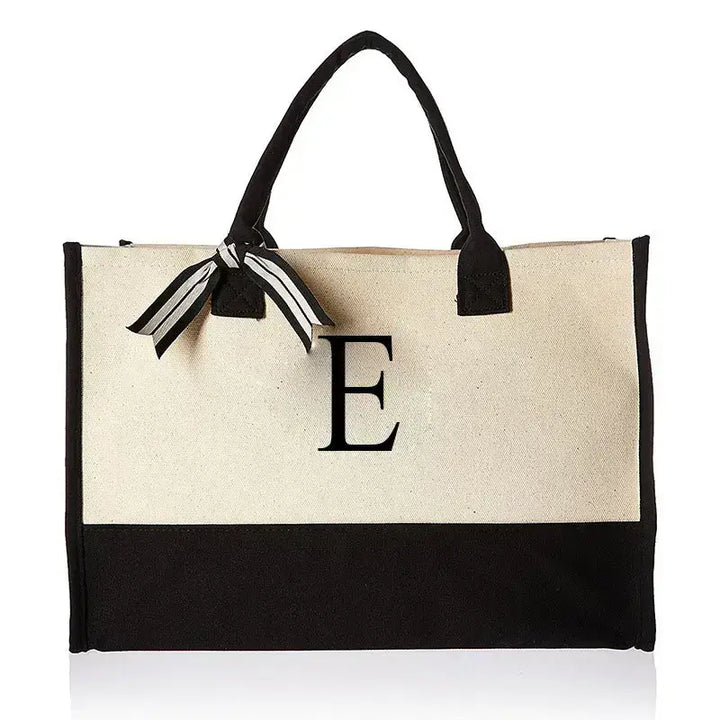 A design featuring the letter 'E' on the Fashion Letters Women's Handbag.
