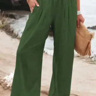 Stylish green elastic waist pants crafted from soft, comfortable fabric, ideal for a casual look, providing durability and a trendy addition to your wardrobe.