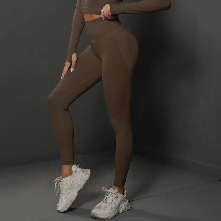 Model wearing High Waist Booty Leggings, showcasing their seamless design and snug fit.
