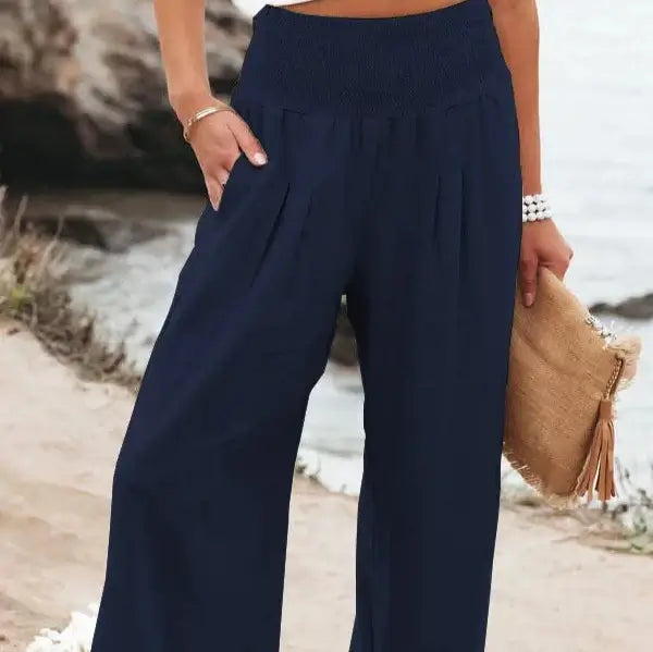 Navy blue elastic waist pants made from soft, comfortable material, offering durability and a classic casual style suitable for everyday wear and various occasions.