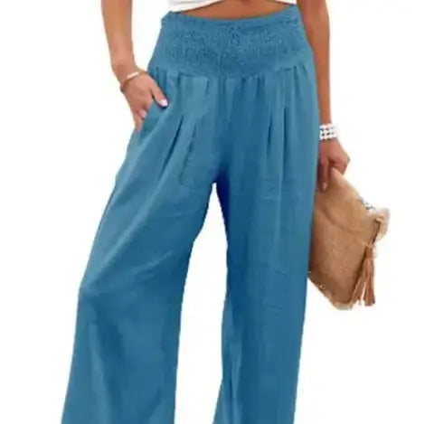 Stunning peacock blue elastic waist pants that combine soft, durable fabric with a trendy casual style, perfect for adding a touch of color to any outfit.