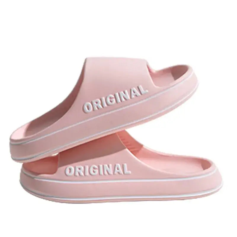 Chic pink anti-slip couple slippers designed for both men and women, perfect for casual outings or lounging at home with style and comfort.